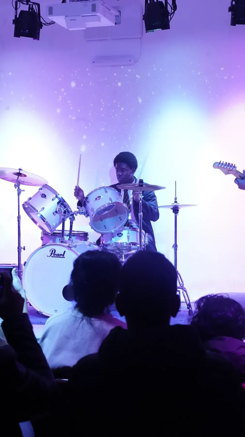 Drummer close-up mid-performance